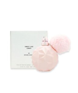Sweet Like Candy perfume bottle with pink geometric design and fluffy pom-pom.