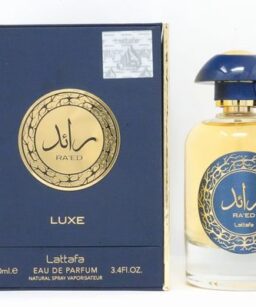 Lattafa Raed Luxe Gold men's perfume in elegant bottle with gold and blue design.