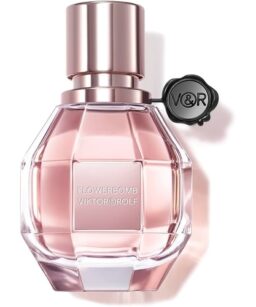 Elegant Flowerbomb Viktor & Rolf perfume bottle with pink liquid and metallic cap.
